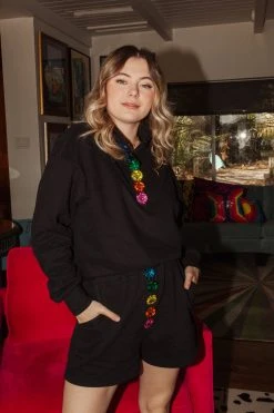 Shop Queen Of Sparkles Rainbow Button Henley Top Tops