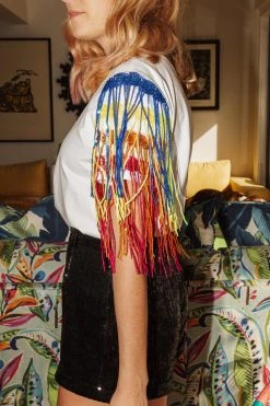 Shop Queen Of Sparkles Tops Rainbow Fringe Sleeve Piñata Tee