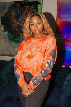 Shop Queen Of Sparkles Sweatshirts Smiley Sequin Sleeve Sweatshirt Red Tie Dye