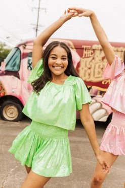 Shop Queen Of Sparkles Neon Green Holo Stripe Flutter Top Spring 2022